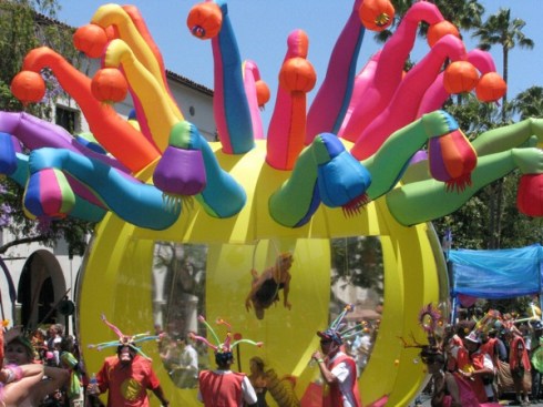 One annual tradition is this float containing acrobat dancers.