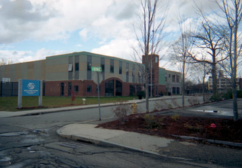 Rafila D. Papit (Romania) on the Boys and Girls Club at Tainter Street: "I call this picture 'The Symbol of Constructive Creativity.'   Why did I take this picture?  I thought this building brings hope and opportunity for all young people.  ...  School should teach you to be your own teacher, the best and most.  Seriously." 
