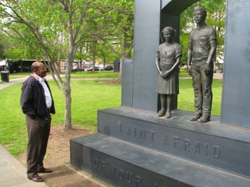 Casey regards the statues honoring participants in the Children's March, of which he was one.